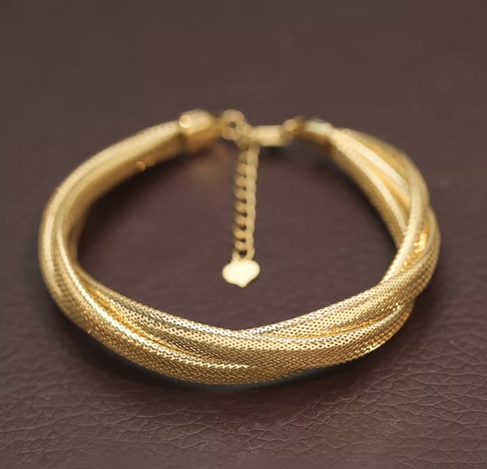K18 蛇 ブレスレット バングル スネーク 18K YG イエローゴールド K18YG ツイスト 太め ゴツい ボリューム ねじり 編み 弾力ブレスレット